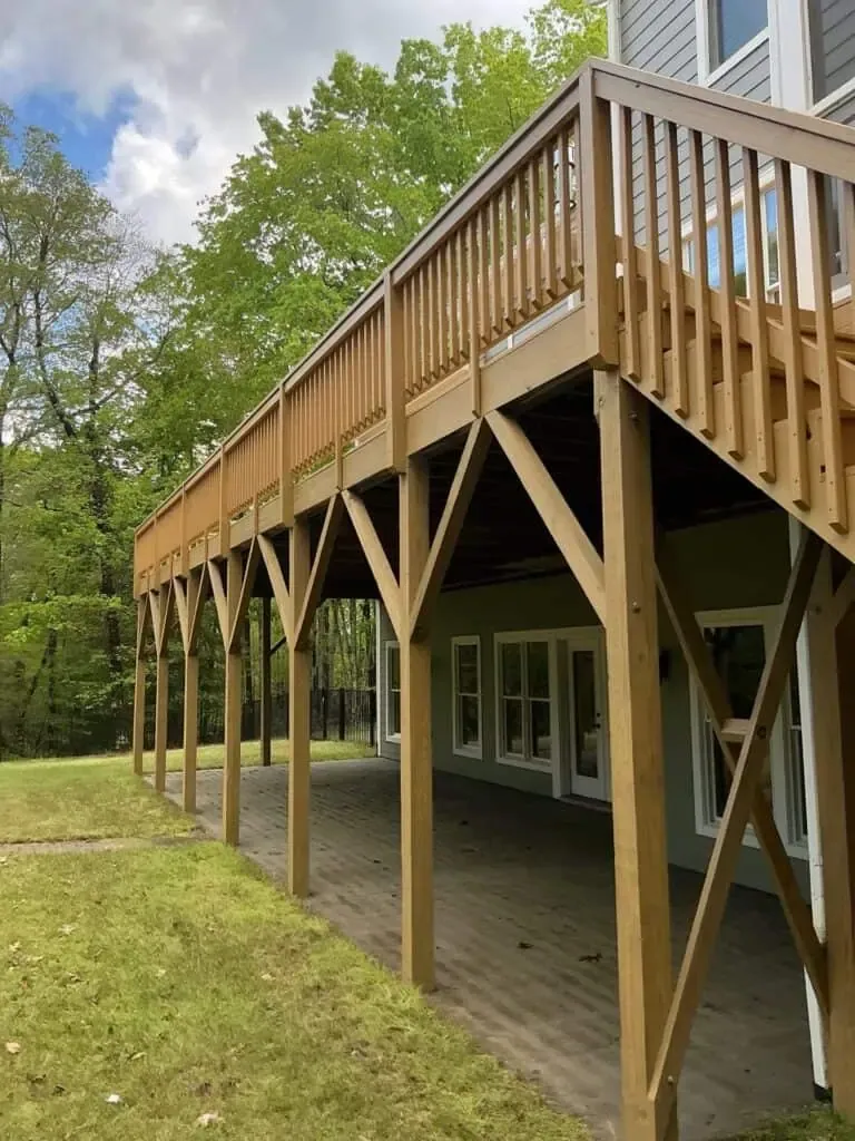 Board-on-board fence with solid stain — great coverage.